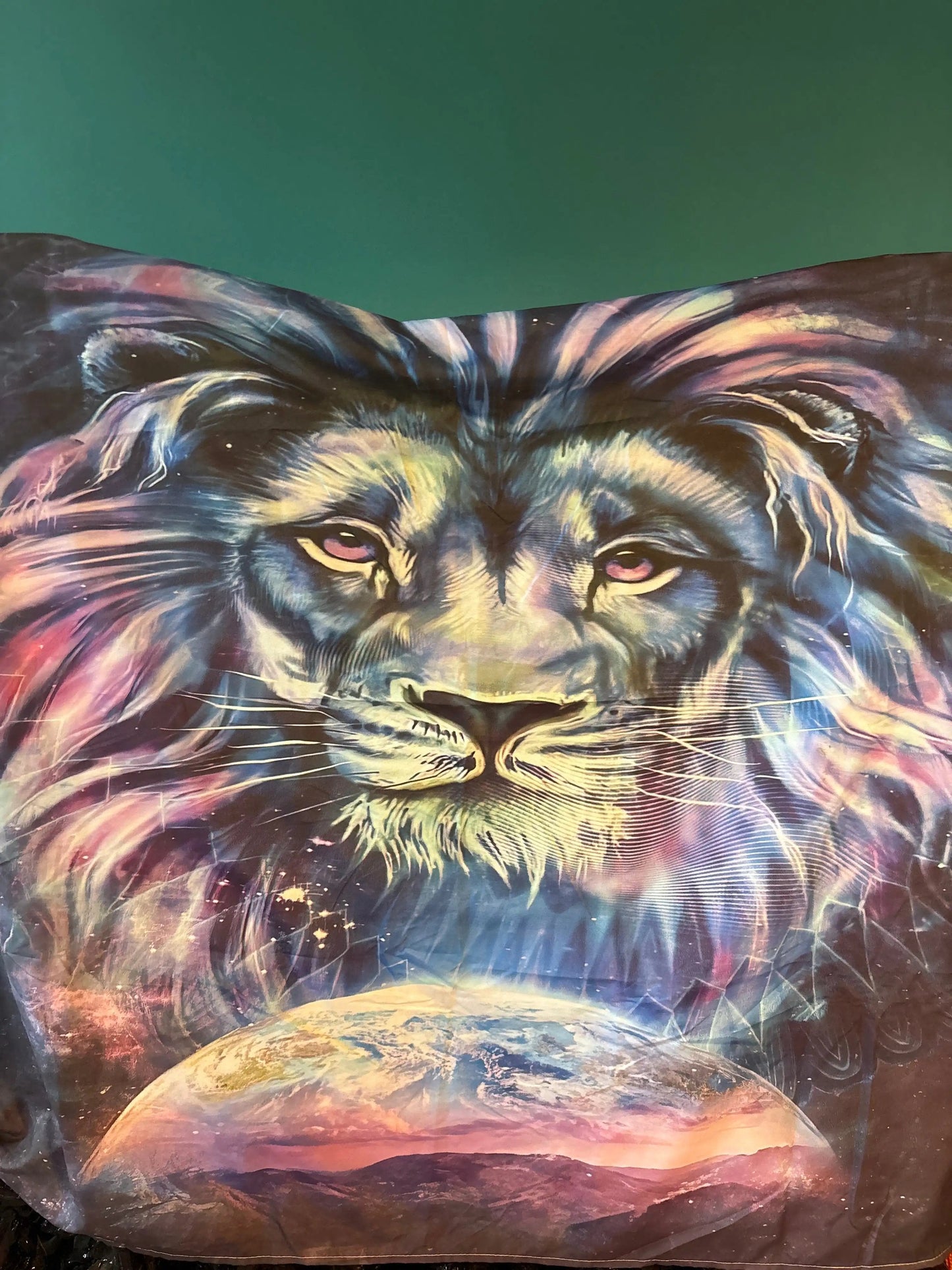 Blue purple lion tapestry with intricate lion face design and vibrant cosmic background