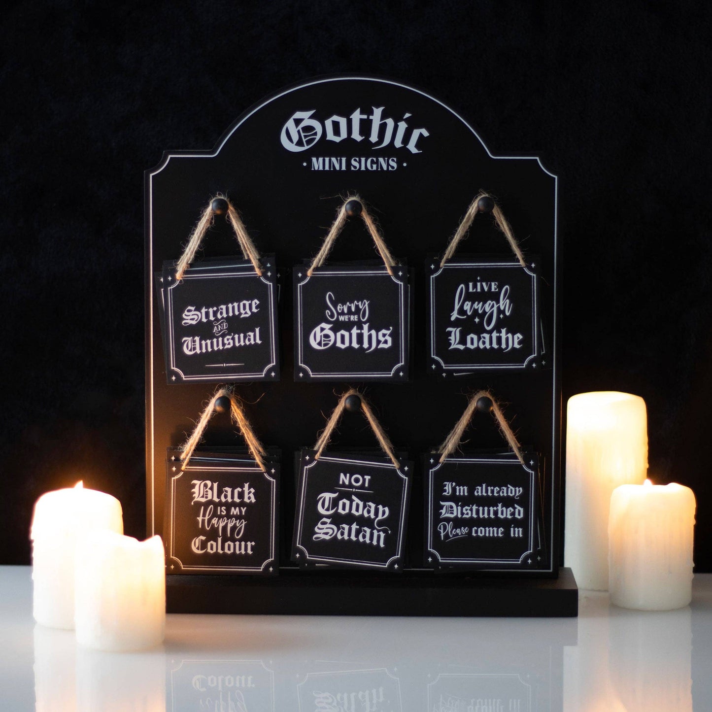 36 Gothic mini signs with comical dark phrases displayed with hanging ropes and candles for gothic home decor