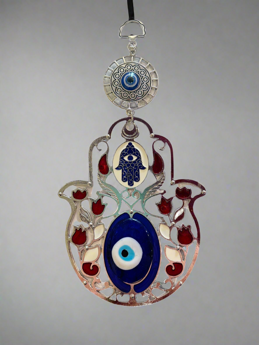 Decorative Fatima Hand ornament with red flowers and blue evil eye charm symbolizing protection and good luck