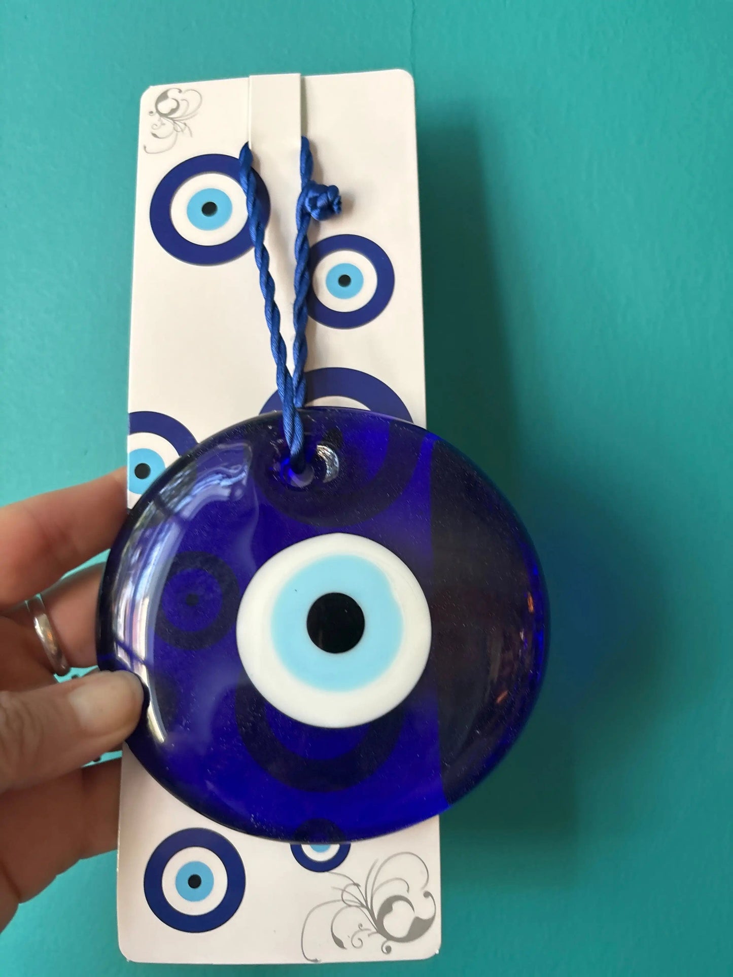 Evil Eye Hanging Glass in blue with iconic eye motif for protection and decoration