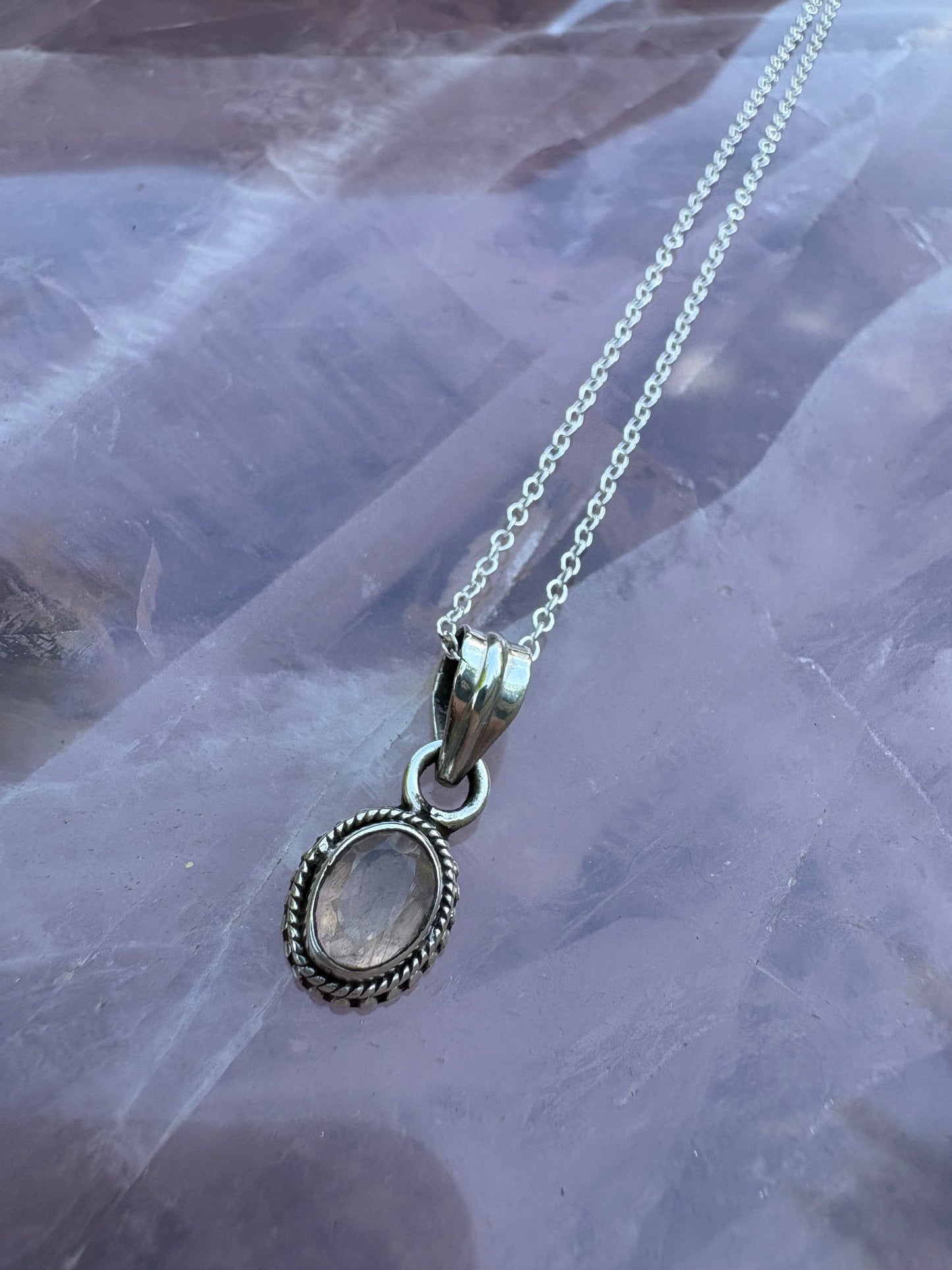 Rose Quartz Pendant with engraved sterling silver setting on a delicate chain