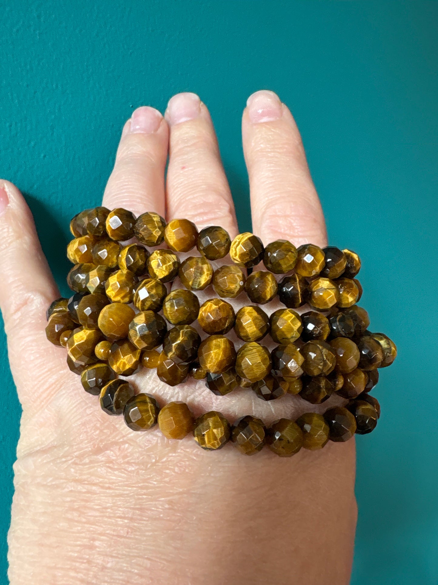 *Bracelet Tiger’s eye faceted 8 mm
