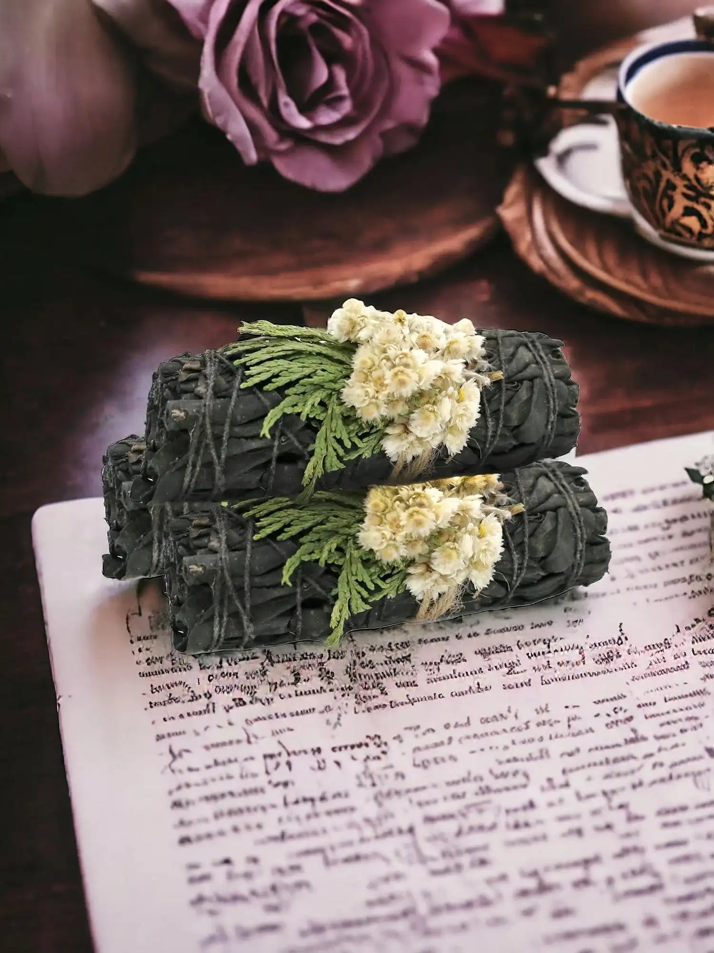 Midnight Bloom Floral White Sage Smudge Sticks with white flowers on handwritten paper