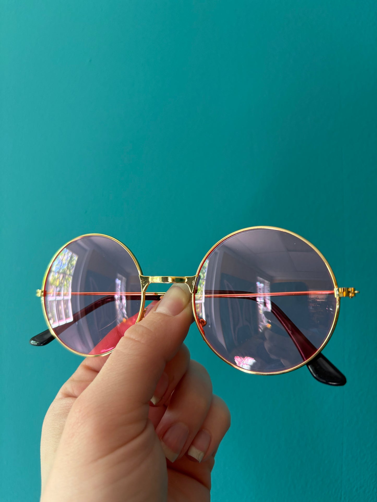 *Gold rimmed Sunglasses