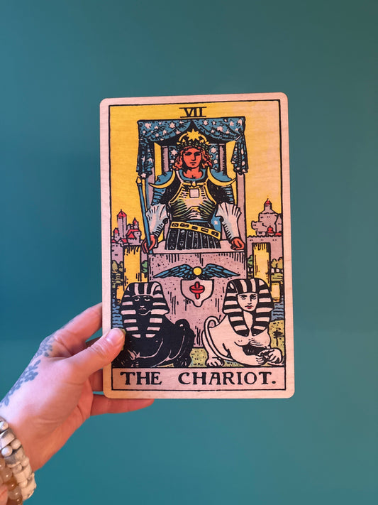 Wood Wall Art Tarot 7 Chariot card design held against teal background