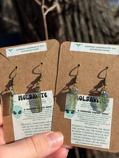 Moldavite and Pyrite earrings featuring green Moldavite and metallic Pyrite stones for spiritual transformation and grounding