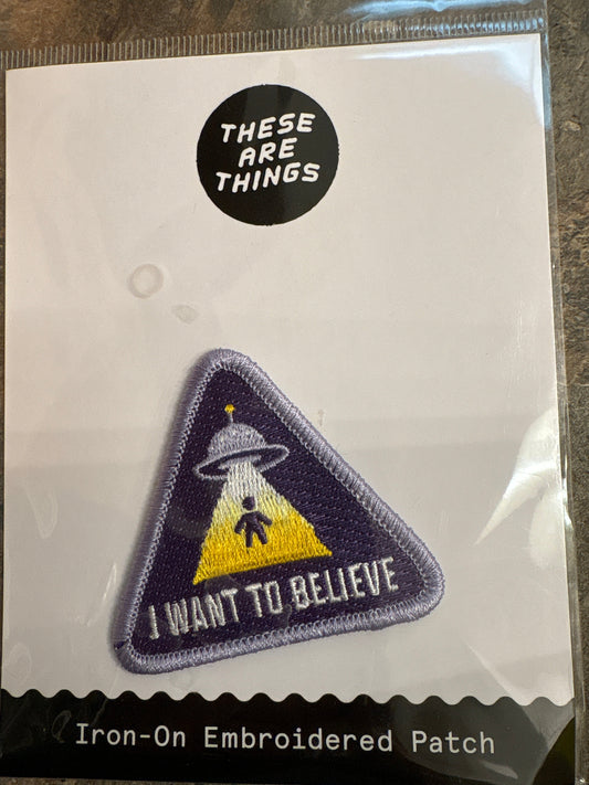 embroidered iron-on "I want to believe" pactch with UFO abducting person design