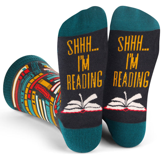 Crew length reading socks with colorful book pattern and "Shhh I'm Reading" message on soles