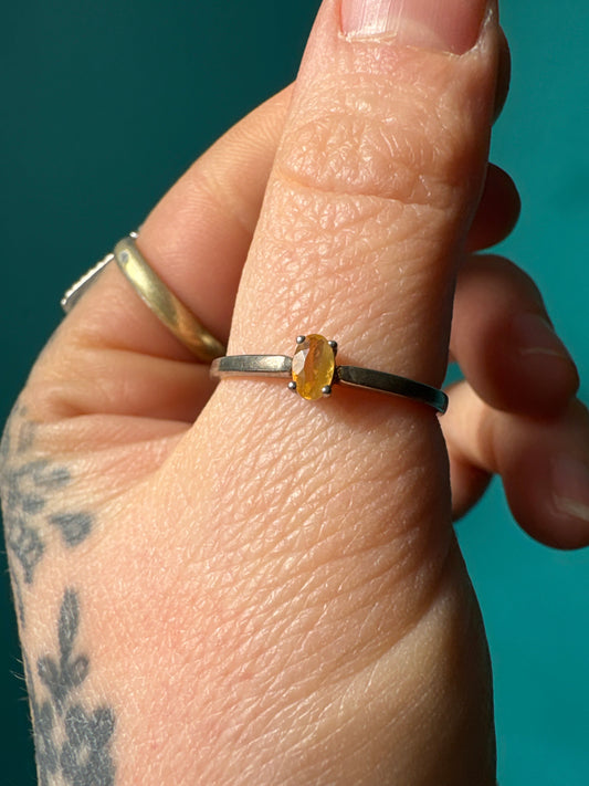 Ring Mexican Fire Opal Oval with oval orange fire opal stone on silver band worn on finger
