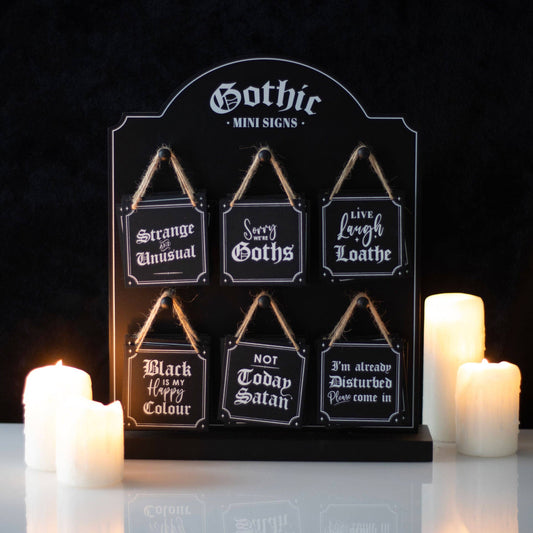 36 Gothic mini signs with comical dark phrases displayed with hanging ropes and candles for gothic home decor