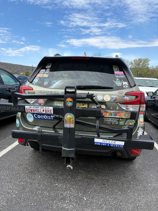 Soul & Summit Bumper Sticker with rainbow logo and forest backdrop on weather-resistant vinyl