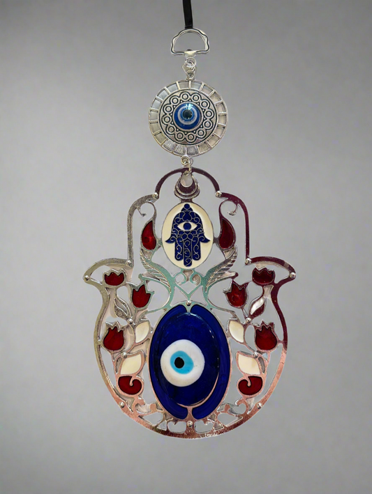 Decorative Fatima Hand ornament with red flowers and blue evil eye charm symbolizing protection and good luck
