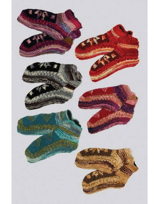 Six pairs of multicolored unisex wool socks (WL-281) arranged on a flat surface, showcasing cozy patterns perfect for fall and winter lounging
