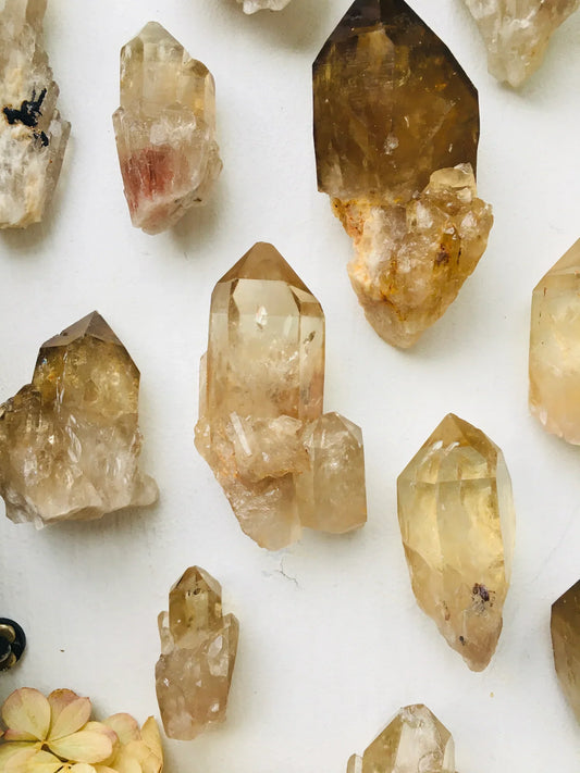 Kundalini Citrine gemstones with golden-yellow hues for spiritual awakening and higher consciousness.