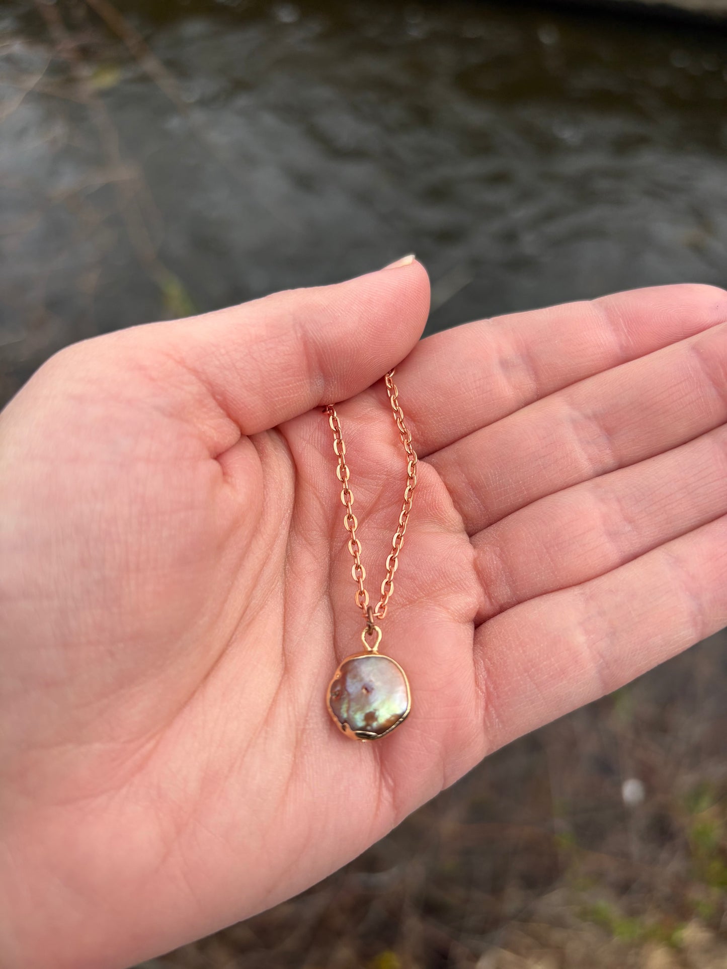 Black Lip Oyster pearl necklace with rose gold chain and iridescent black pearl pendant
