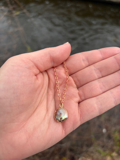 Black Lip Oyster pearl necklace with rose gold chain and iridescent black pearl pendant