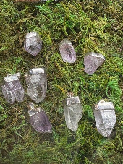 Raw Vera Cruz amethyst pendant in sterling silver with soft lavender hues and spiritual healing properties