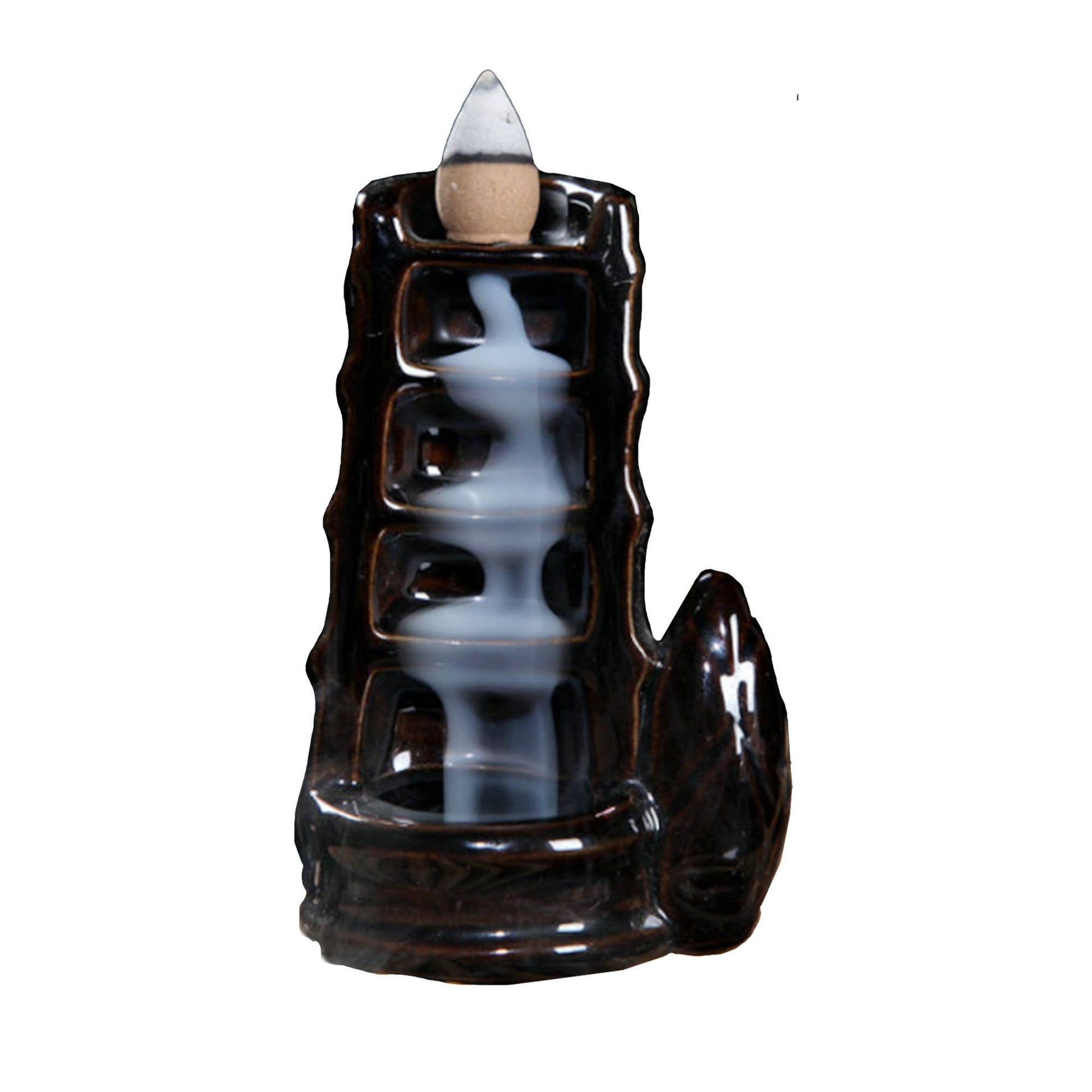 Ceramic backflow incense burner with tower waterfall design releasing smoke cascading down steps