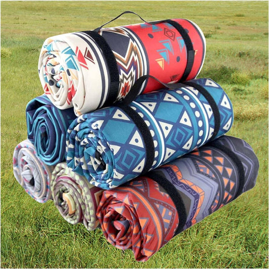 Folded colorful outdoor camping mats with waterproof aluminum foil EVA base and polyester surface, lightweight and portable for hiking, picnic, and beach use.