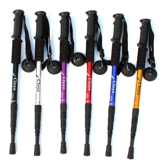 High density aluminum alloy retractable trekking walking poles in multiple colors with ergonomic handles and adjustable length.