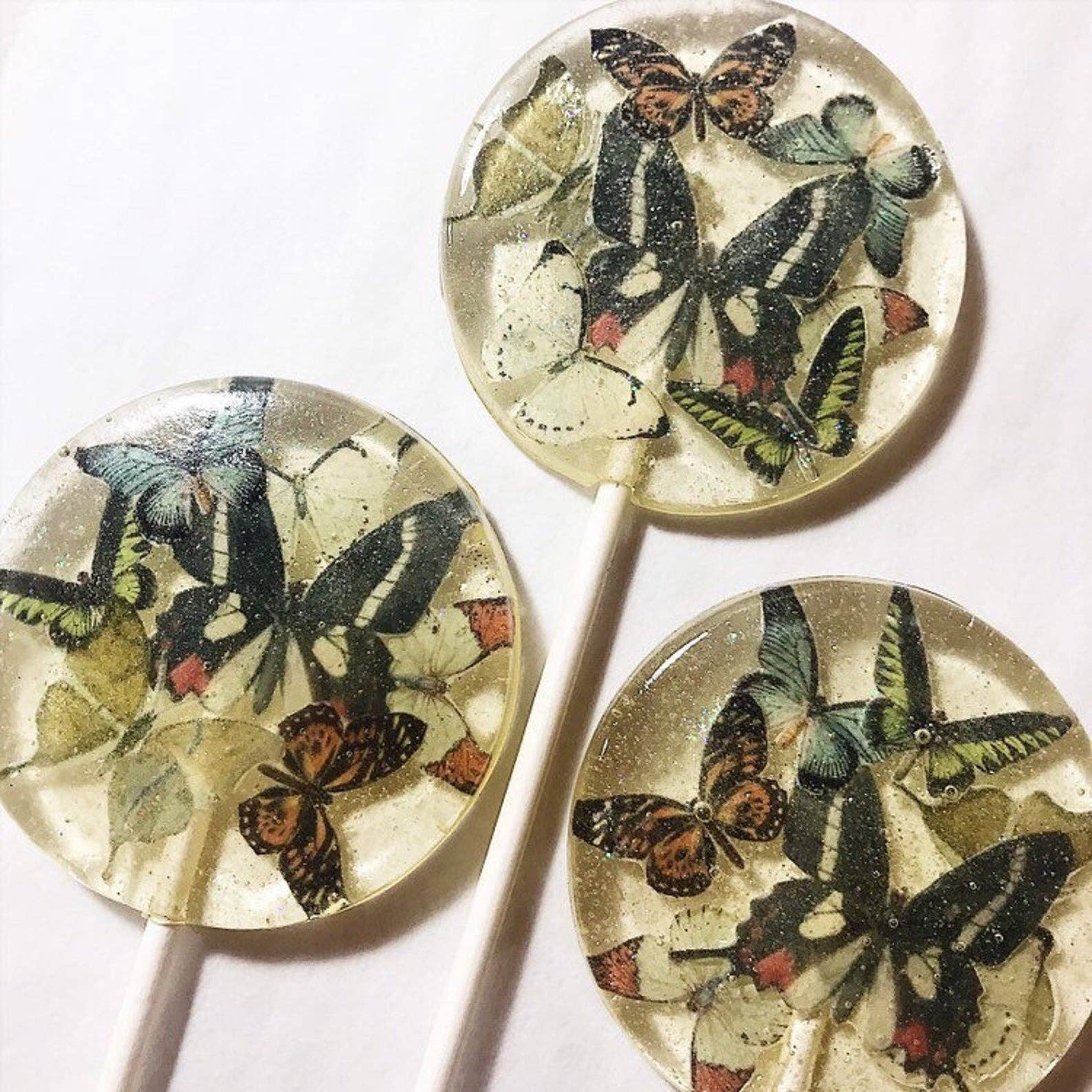 Kaleidoscope Butterflies Lollipops with edible wafer paper butterflies and edible glitter, individually wrapped with satin bows