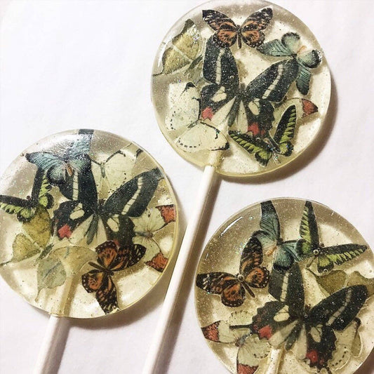 Kaleidoscope Butterflies Lollipops with edible wafer paper butterflies and edible glitter, individually wrapped with satin bows