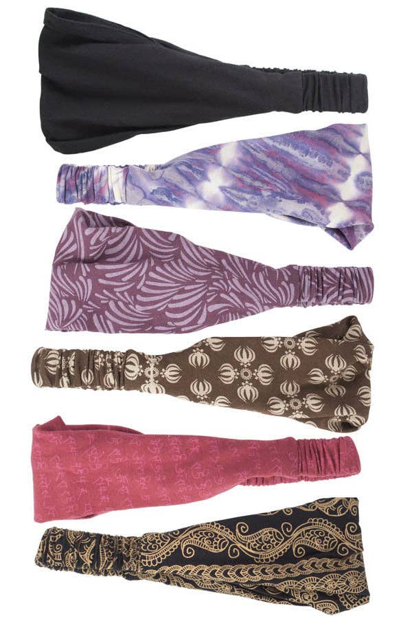 Set of six organic cotton assorted headbands in various colors and patterns, wide and stretchy for comfortable wear.