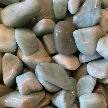 Smooth polished Amazonite tumble stones in soothing blue-green shades for calming and balance