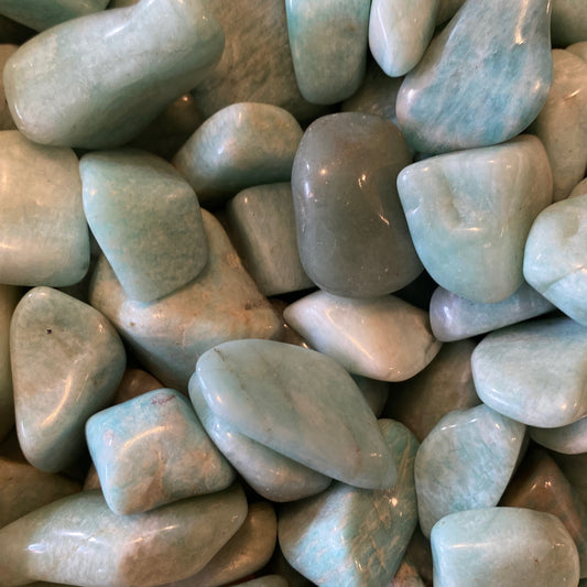 Smooth polished Amazonite tumble stones in soothing blue-green shades for calming and balance