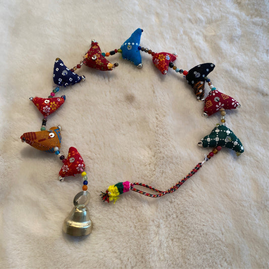 Prosperity hens handcrafted from recycled saris with colorful fabric and beads, measuring 12 inches with a hanging bell.
