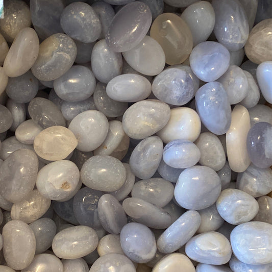 Blue Lace Agate tumble stones with smooth polished surface in light blue and gray tones