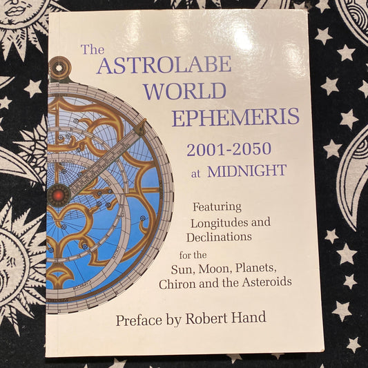 The Astrolabe World Ephemeris 2001-2050 at midnight showing celestial longitudes and declinations for Sun, Moon, planets, Chiron, and asteroids