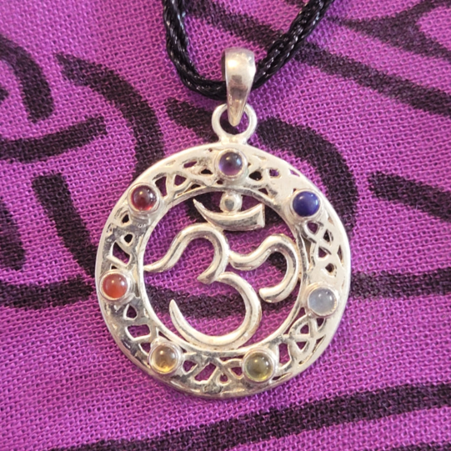 7 Chakra Om Pendant with seven colorful crystals and Om symbol on silver round pendant