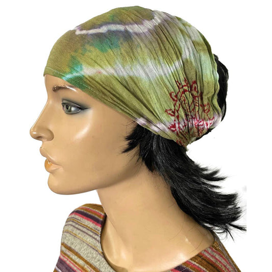 Tie Dye Mantra Headband in green with red design on mannequin head side view