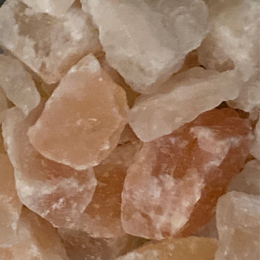 Close-up of pink and white Himalayan Salt Tumble crystals