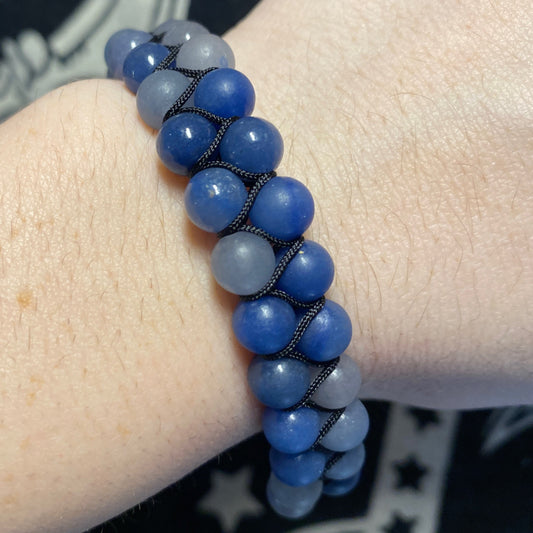 Blue Aventurine double row beaded bracelet on wrist with alternating dark and light blue stones