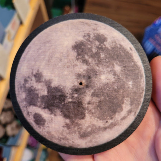 Moon Incense Burner with realistic full moon design and central hole for incense placement