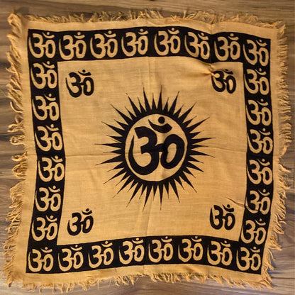 Om altar cloth with black Om symbols on beige fabric and fringed edges